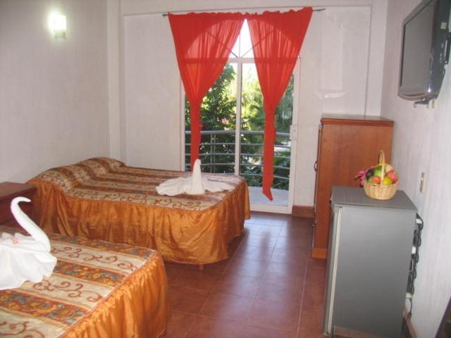 Hotel Y Suites Bugambilias Ринкон-де-Гуайябитос Номер фото