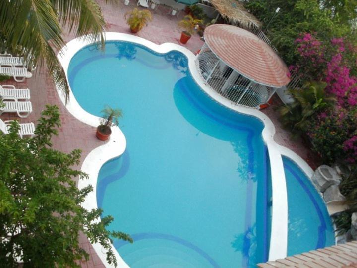Hotel Y Suites Bugambilias Ринкон-де-Гуайябитос Экстерьер фото